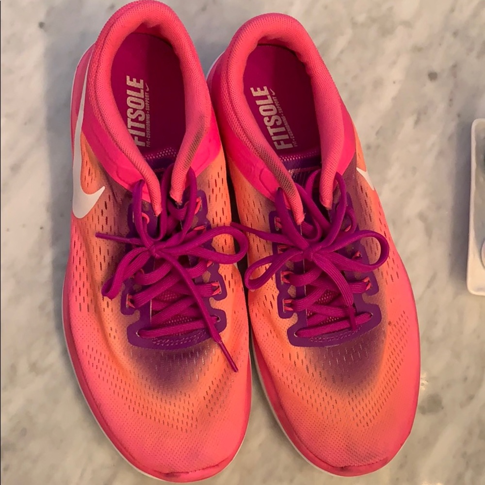 Bright pink purple and orange Nike’s